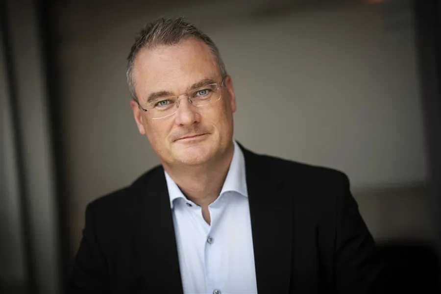 Jan Frich. En mann med briller